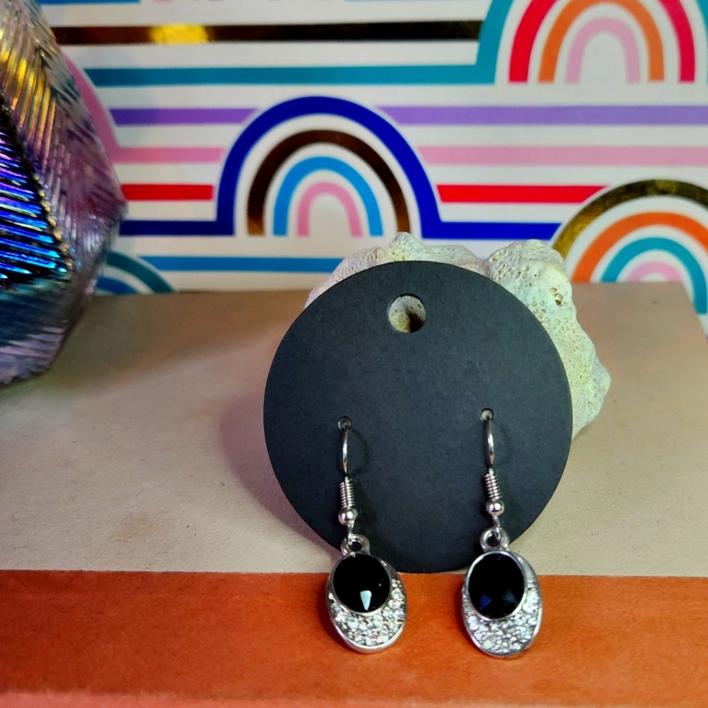 Silver, black, and cubic zirconia earrings